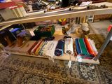 a shelf with many items on it in a room