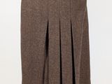 a woman ' s skirt with pleas on a mannequin mannequin mannequin mannequin mannequin mannequin mannequin mann