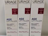 three boxes of uriage age lift filler sitting on a table