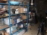 many boxes on the shelves in the room