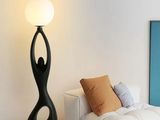 a lamp that is sitting on a table in a living room