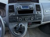a dashboard of a car with a steering wheel and dashboard controls
