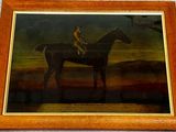 painting of a jockey on a horse in a landscape