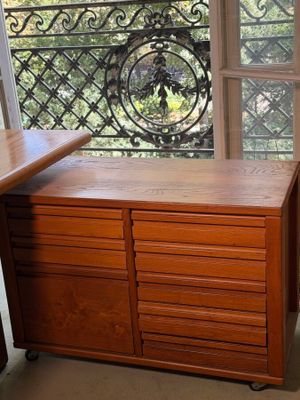 an image of a dresser in a room with a window