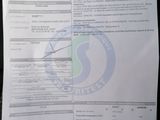 a close up of a document with a barcode on it