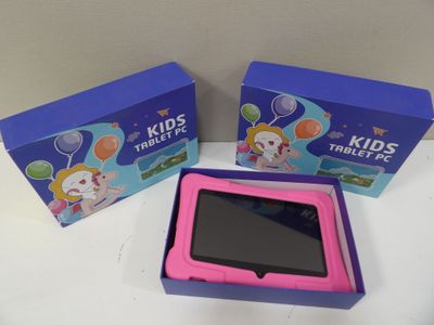 a pink tablet that is sitting in a blue box