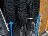 a lot of chairs that are sitting in a room