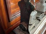 a wooden table with a glass vase on top of it