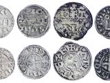 six types différents de pièces d'argent sont représentés sur un fond blanc