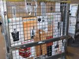 a large metal cage with a bunch of boxes in it