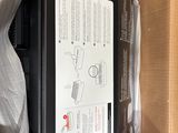 a box that has a printer in it and a box that has a printer inside of it