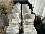 many chairs and umbrellas lined up in a row
