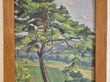 an oil painting of a tree in a wooden frame on a table