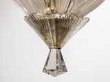 an image of a glass chandelier hanging from a ceiling