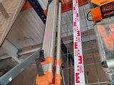 many different types of tools on a shelf in a warehouse
