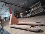 a wooden pallet sitting on the floor in a warehouse