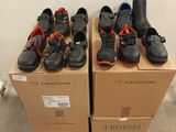 many pairs of shoes that are on top of boxes