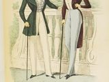 two men in formal clothing standing next to each other on a balcony