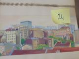 une photo d'un calendrier sur lequel figure une photo d'une ville