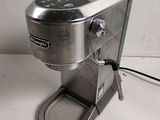 a coffee maker that is sitting on a table