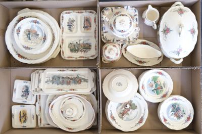 de nombreuses pièces de vaisselle dans une boîte posée sur la table