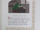 a card with a picture of a man sitting at a desk