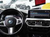 a dashboard of a car with a laptop on it