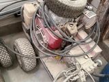 an image of a small engine on a cart