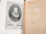 an open book with a picture of a man on it