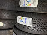 a lot of tires that are stacked on top of each other