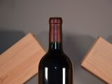 a bottle of wine that is sitting on a table