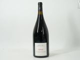 a bottle of wine that is sitting on a table