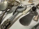 a table with silverware and silverware on it