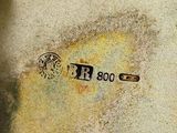 a picture of a close up of a plate with numbers on it