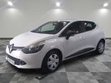 the white car is parked on a checkered floor in the garage