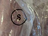 a plastic bag with a dollar sign on it