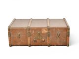 an old suitcase sitting on top of a white surface