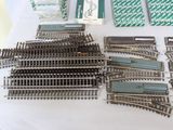 a table with a lot of train tracks on it