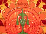 a large orange and green turkey on a red and orange background