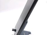 a cell phone that is sitting on top of a stand