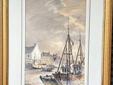 framed picture of a painting of a boat in a harbor