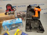 a box with a drill and a tool in it on a table
