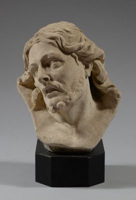 buste en marbre représentant un homme aux cheveux longs et à la barbe fournie