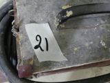 a piece of paper with the letter r on it sitting in a bucket