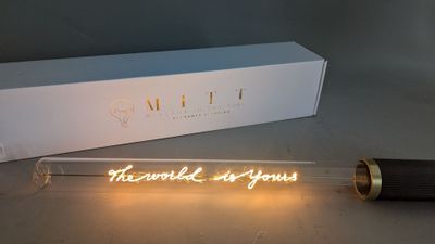 a light that is sitting on a table next to a box
