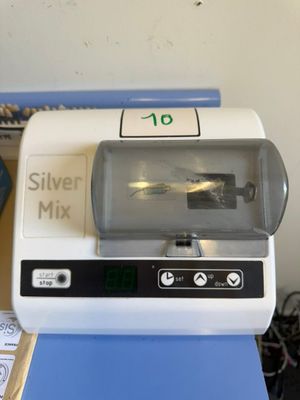 a machine that is sitting on top of a blue table