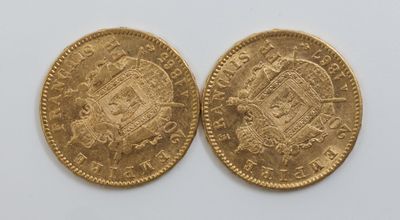 two gold sovereigns, one of which is a sovereign and the other of which is a sovereign