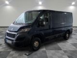 a picture of a black van parked on a checkered floor