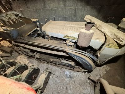 an image of a car that has been left in the garage