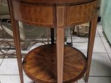 a table that has a shelf on top of it